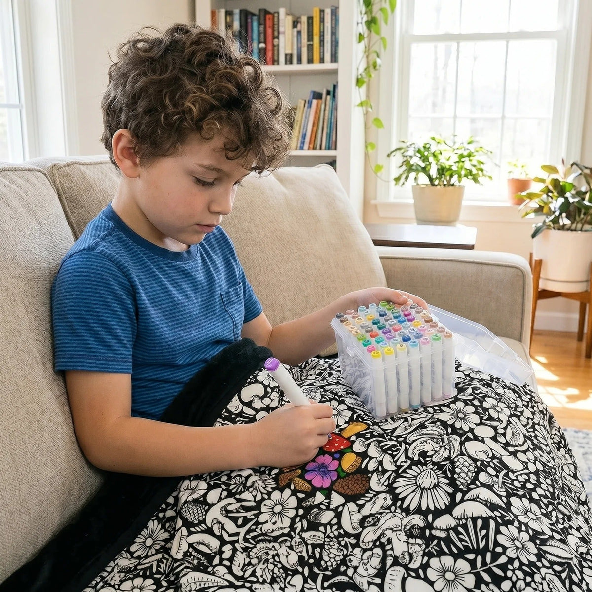 Child colouring the blanket