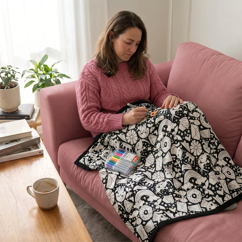 Colouring a Snuggle It blanket on the couch